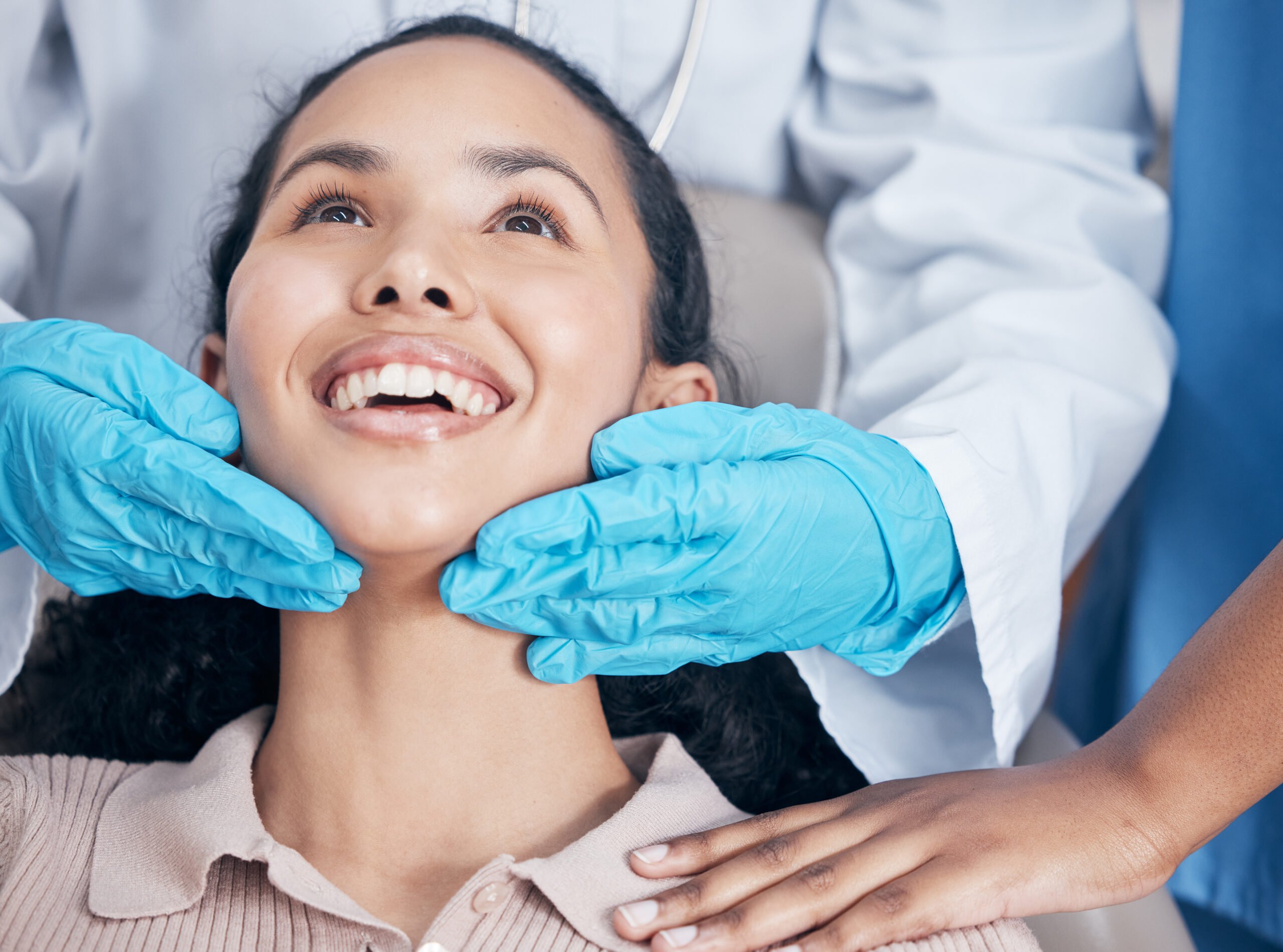 a job well done. Shot of a dentist checking their handiwork after a procedure